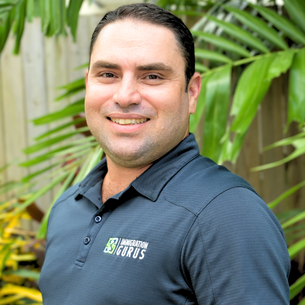 Portrait of Nat, Director & Migration Agent at Immigration Gurus.